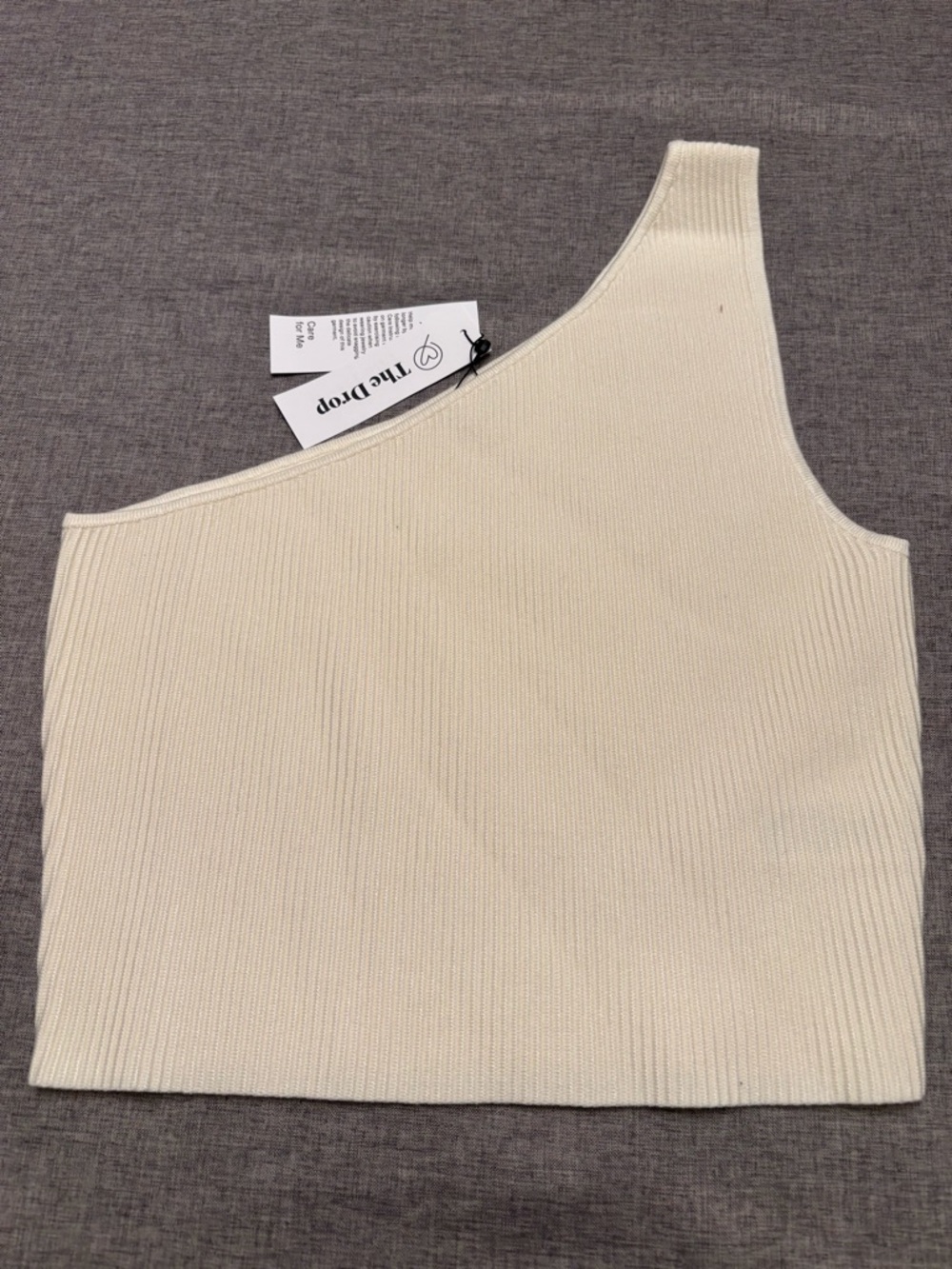 The Drop Kofi One-Shoulder Knit Crop Top in Whisper White 
Size Medium